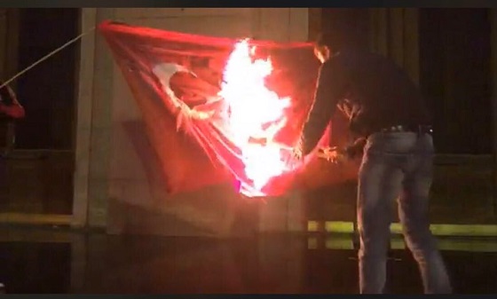 Young Armenians burn Turkish national flag at Liberty Square in Yerevan